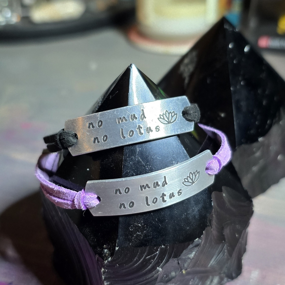 2 Silver Thich Nhat Hanh Quote Bracelets with Lotus Design.